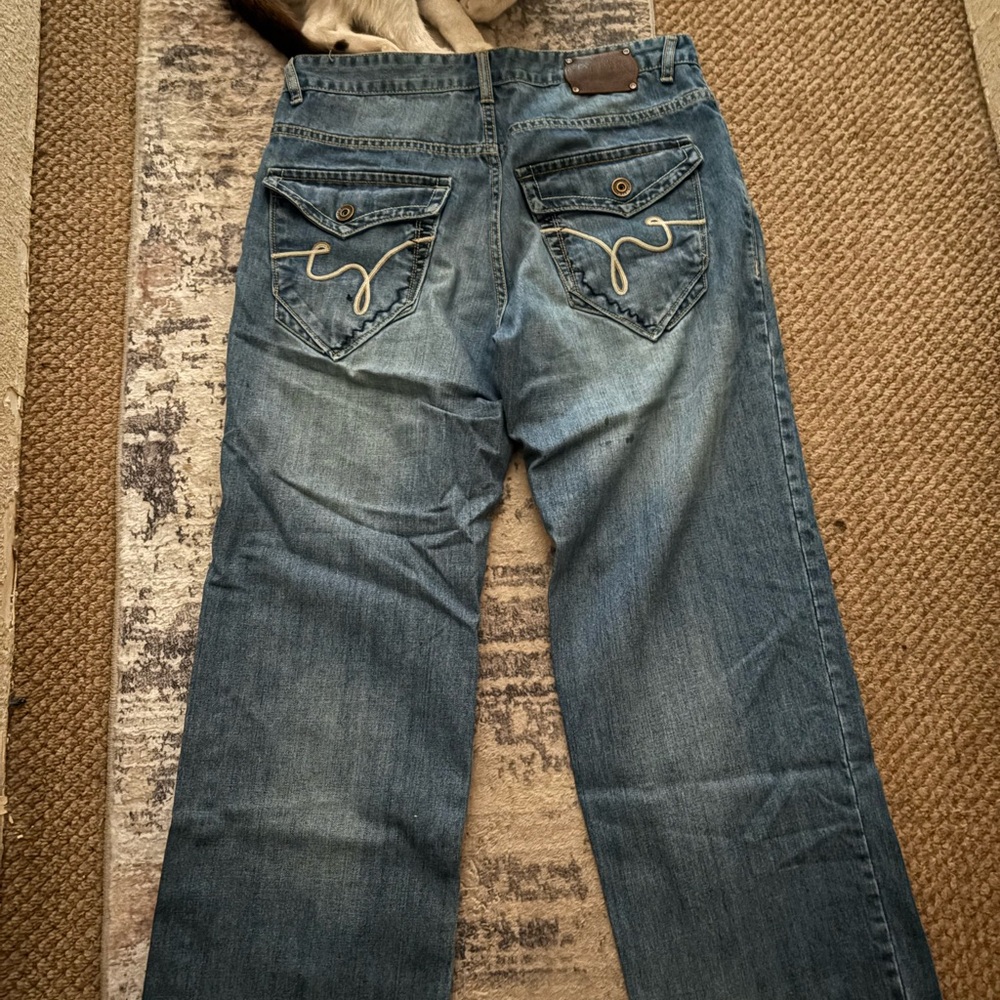Stylish Blue Jeans with Embroidered Pockets